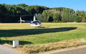 Politie verbaliseert R44 heli die naast het circuit in Zolder landde Politie verbaliseert R44 heli die naast het circuit in Zolder landde